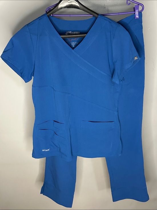 Grey's Anatomy Tops - Grey’s Anatomy Women’s by Barco Signature Empire Wrap Scrub Top in Royal Blue